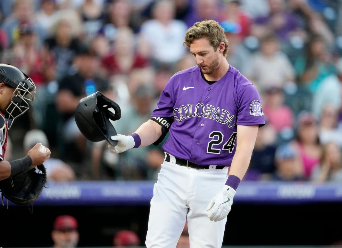 Ryan McMahon reacts after striking out