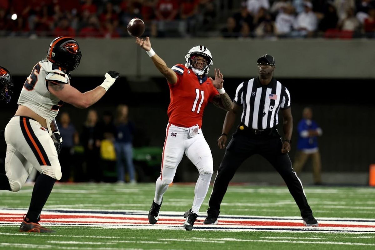 Arizona Wildcats quarterback Noah Fifita throws downfield against Oregon State.