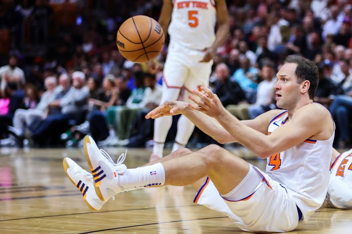 Apr 2, 2024; Miami, Florida, USA; New York Knicks forward Bojan Bogdanovic (44) passes the basketball against the Miami Heat during the second quarter at Kaseya Center.