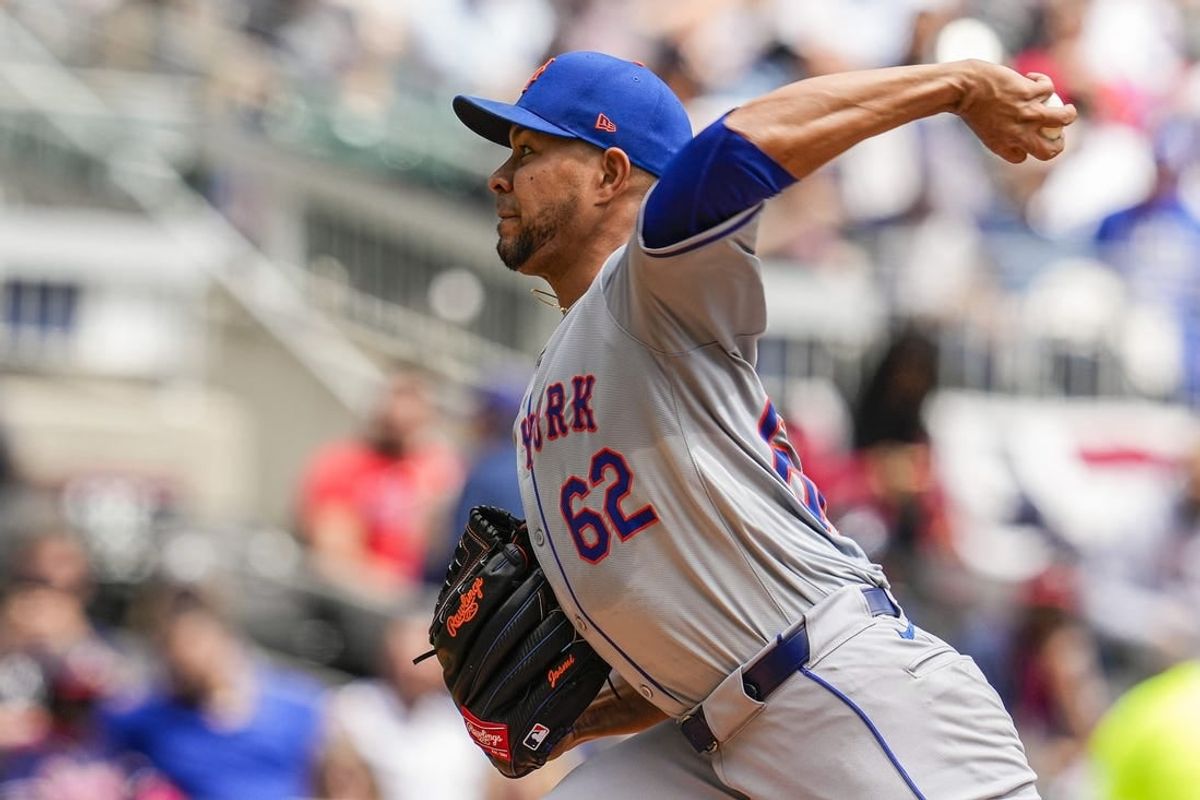 Apr 11, 2024; Cumberland, Georgia, USA; New York Mets starting pitcher Jose Quintana (62) pitches against the Atlanta Braves during the second inning at Truist Park.