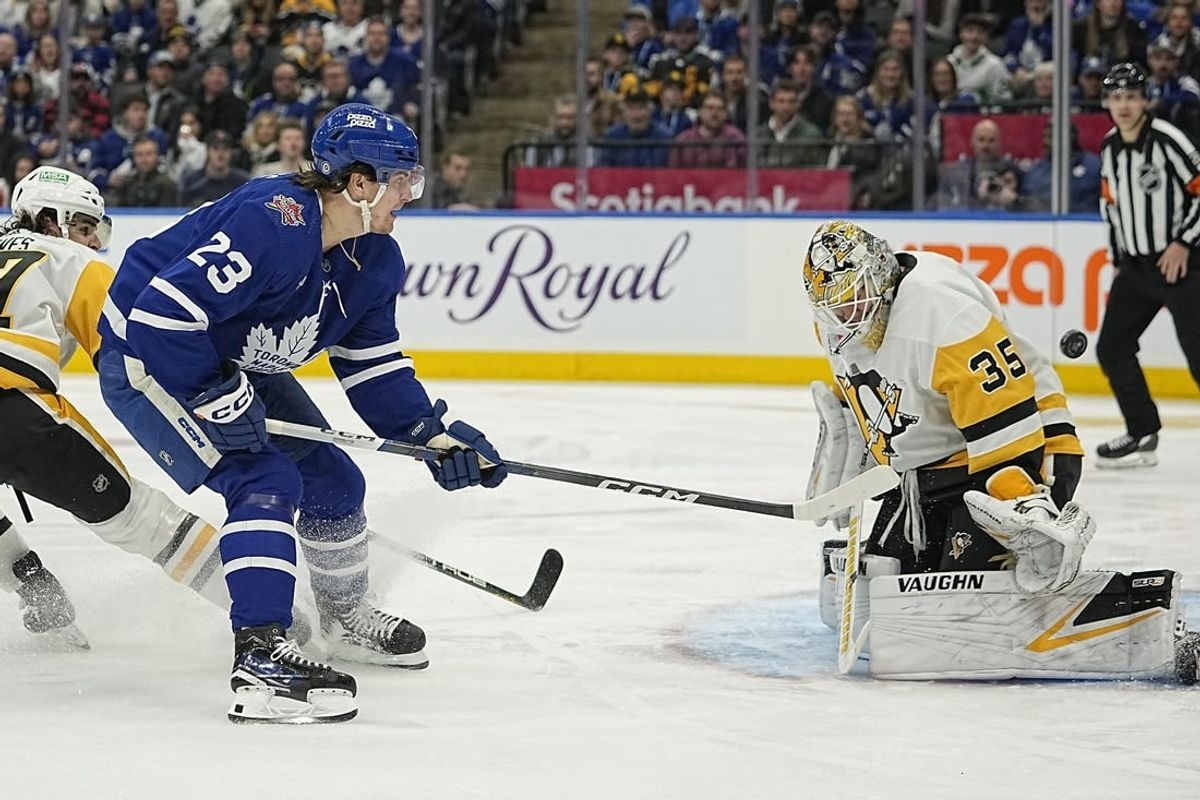 Dec 16, 2023; Toronto, Ontario, CAN; Toronto Maple Leafs forward Matthew Knies (23) scores against Pittsburgh Penguins goaltender Tristan Jarry (35) during the first period at Scotiabank Arena.