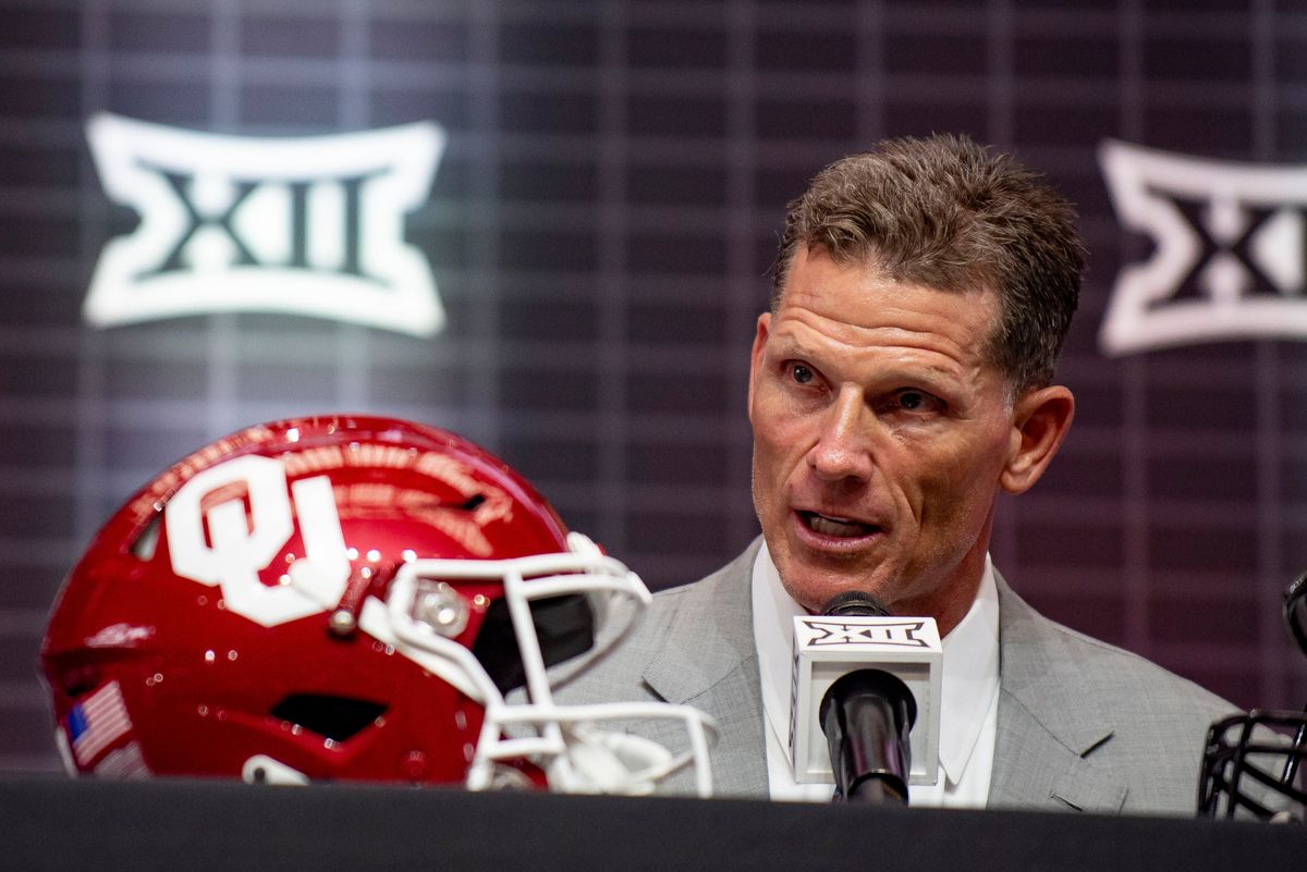 Oklahoma coach Brent Venables answers questions from reporters during the Big 12 college football media days in Arlington, Texas.