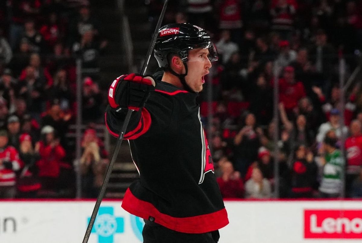 Feb 8, 2024; Raleigh, North Carolina, USA; Carolina Hurricanes center Martin Necas (88) scores a goal against the Colorado Avalanche during the first period at PNC Arena.