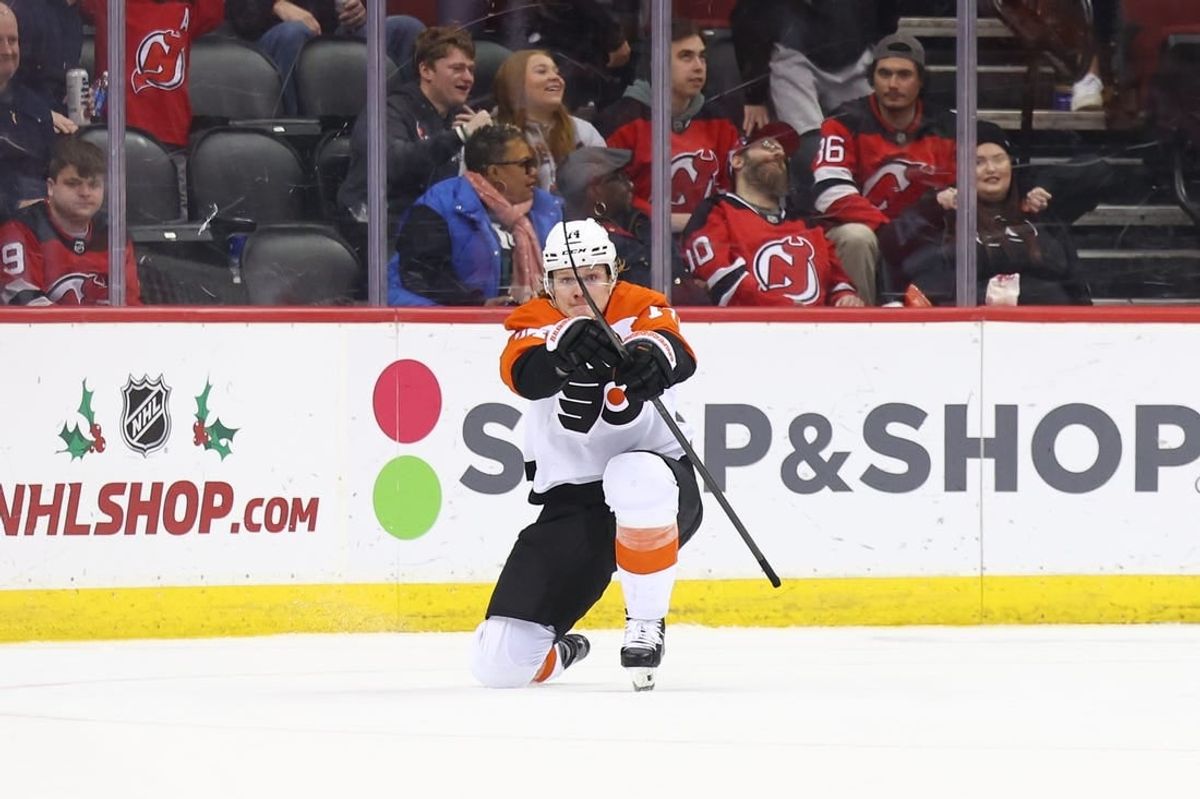 Dec 19, 2023; Newark, New Jersey, USA; Philadelphia Flyers right wing Owen Tippett (74) celebrates his game-winning goal against the New Jersey Devils during overtime at Prudential Center.