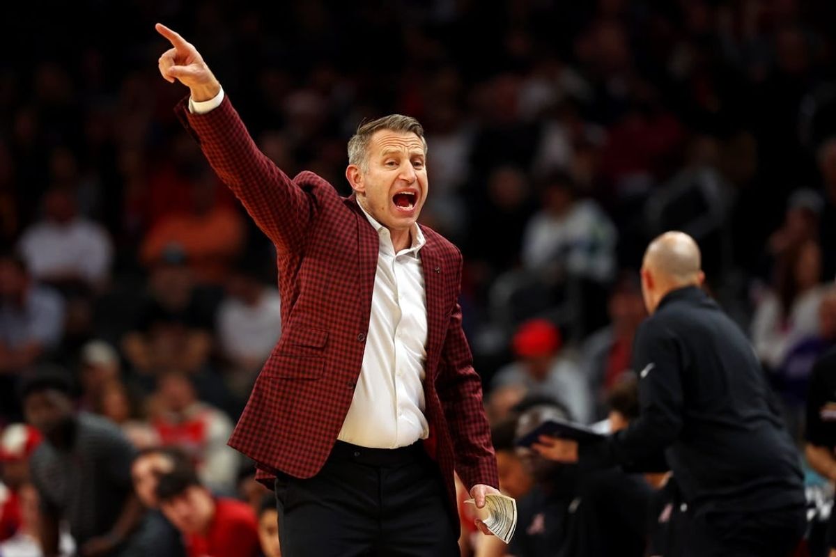 Dec 20, 2023; Phoenix, Arizona, USA; Alabama Crimson Tide head coach Nate Oats signals to his team during the first half of the game against the Arizona Wildcats in the Hall of Fame Series at Footprint Center.