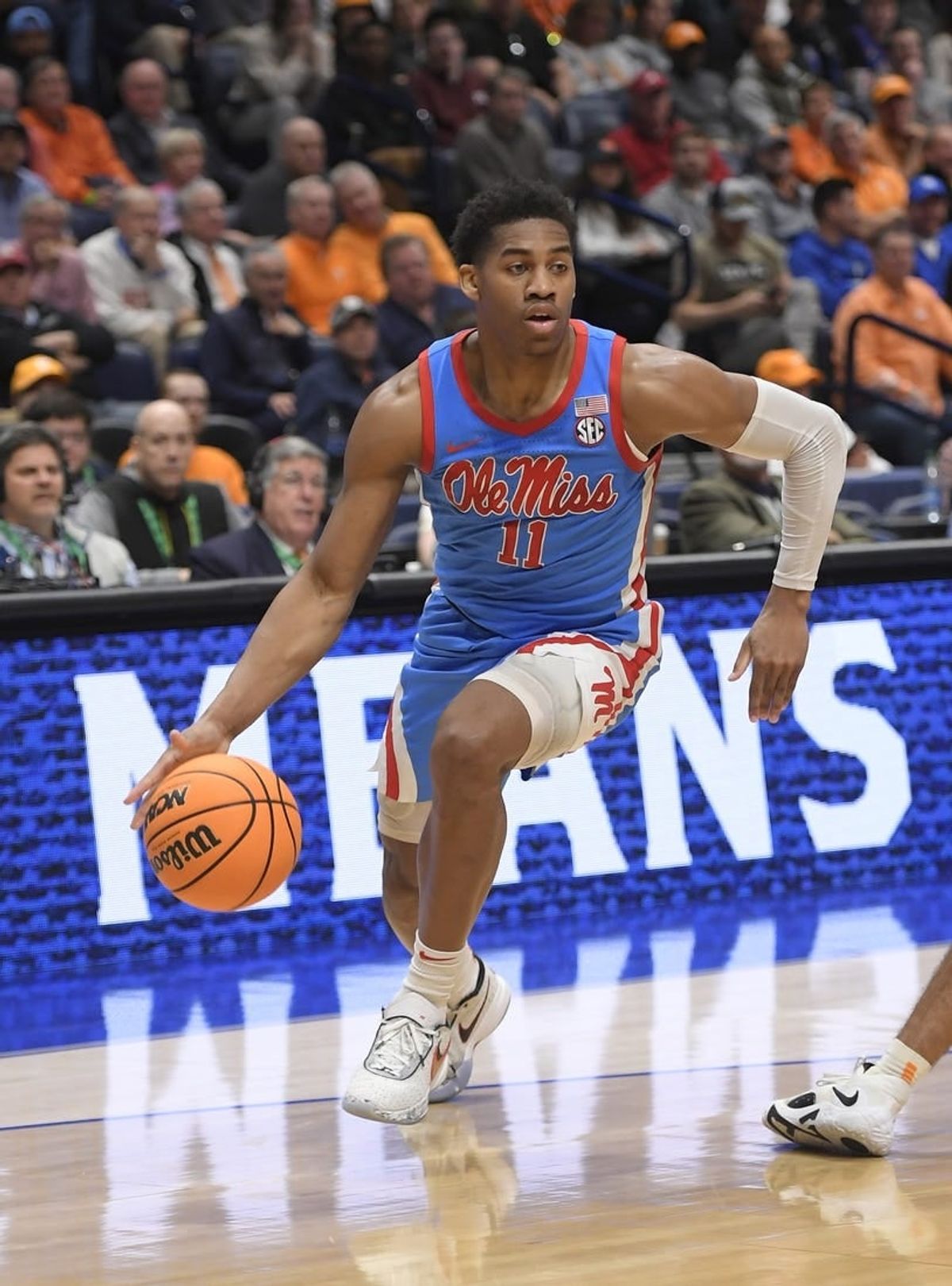 Mar 9, 2023; Nashville, TN, USA;  Mississippi Rebels guard Matthew Murrell (11) dribbles baseline against the Tennessee Volunteers during the first half at Bridgestone Arena.