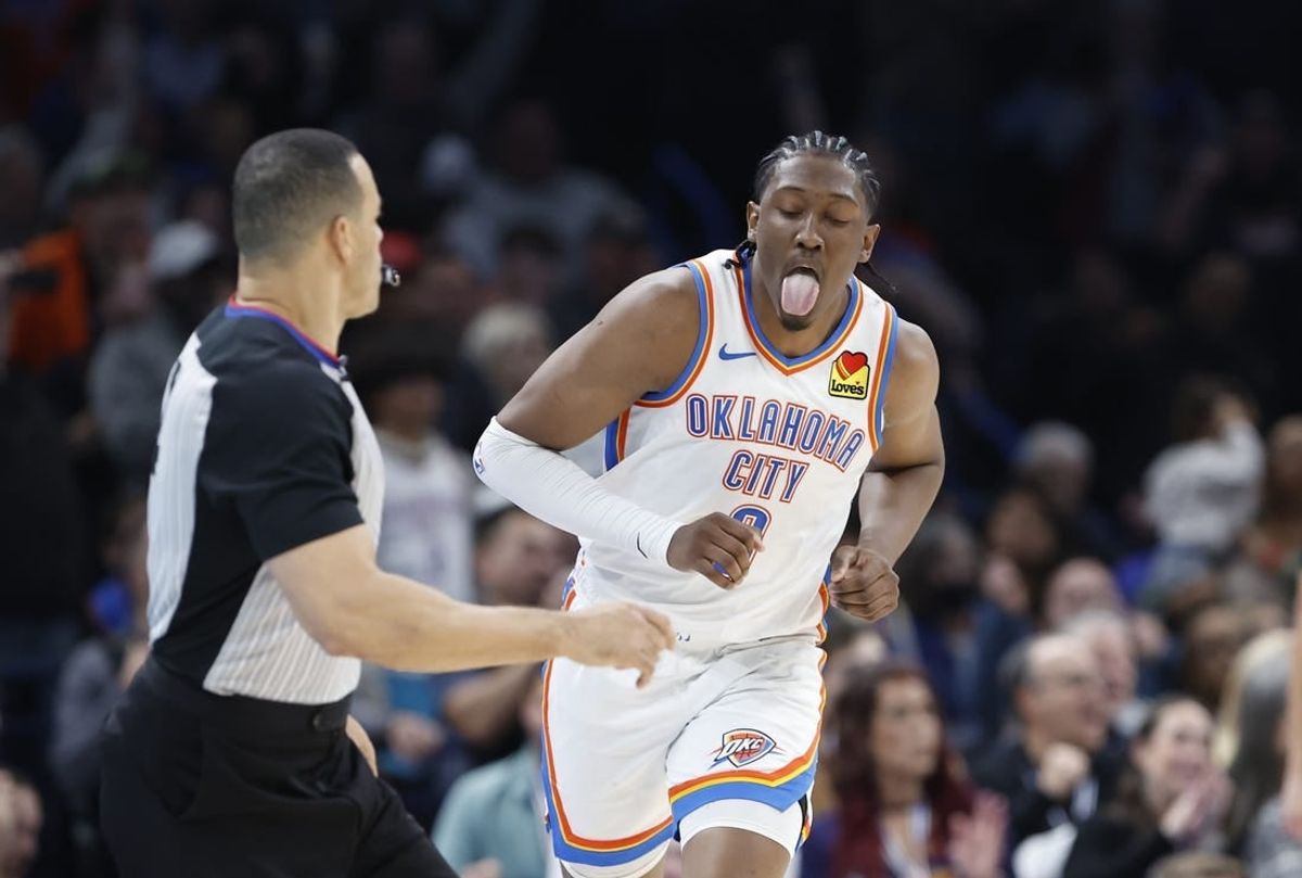 Dec 8, 2023; Oklahoma City, Oklahoma, USA; Oklahoma City Thunder forward Jalen Williams (8) reacts after scoring a basket against the Golden State Warriors during the second half at Paycom Center.