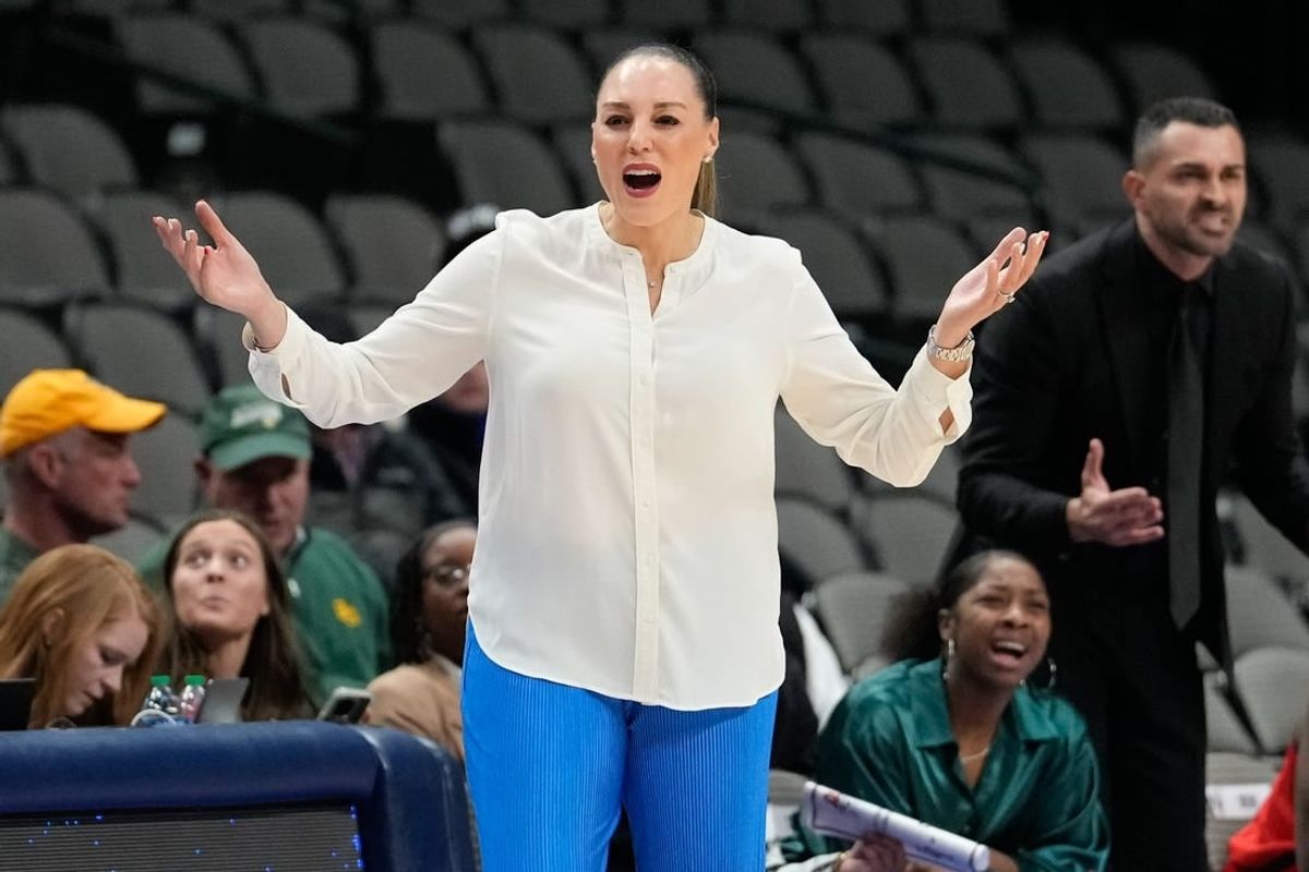 Dec 18, 2022; Dallas, Texas, USA; Arizona Wildcats head coach Adia Barnes reacts to a call against the Baylor Lady Bears during the first half at American Airlines Center.