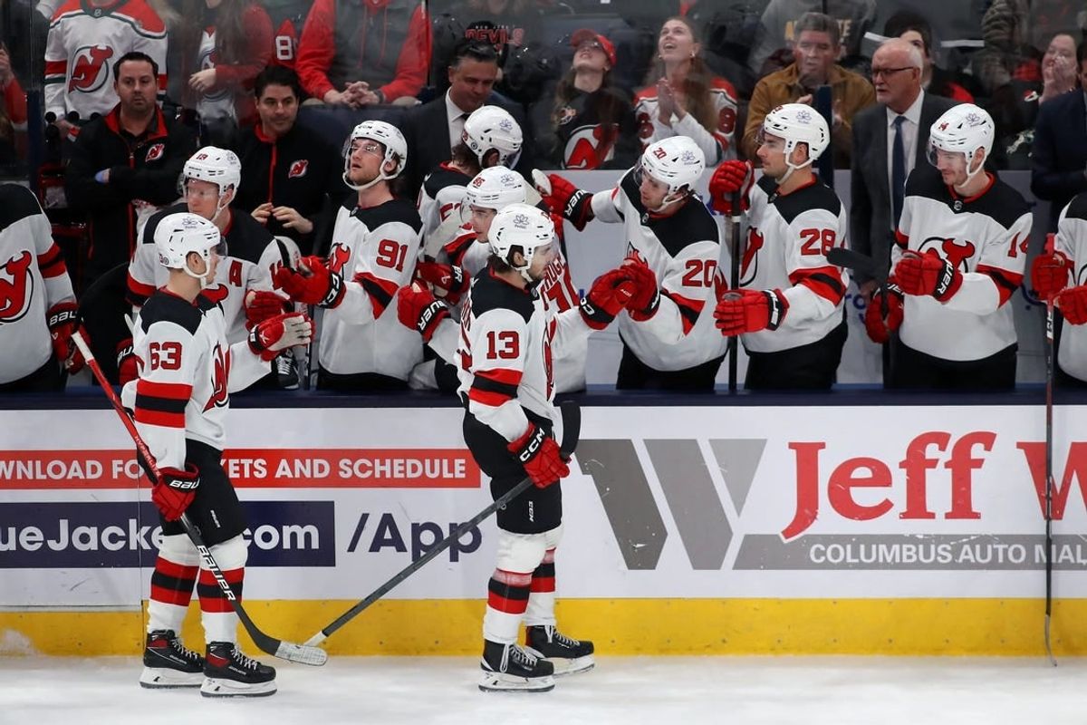 Dec 16, 2023; Columbus, Ohio, USA; New Jersey Devils center Nico Hischier (13) celebrates his goal with teammates during the third period against the Columbus Blue Jackets at Nationwide Arena.