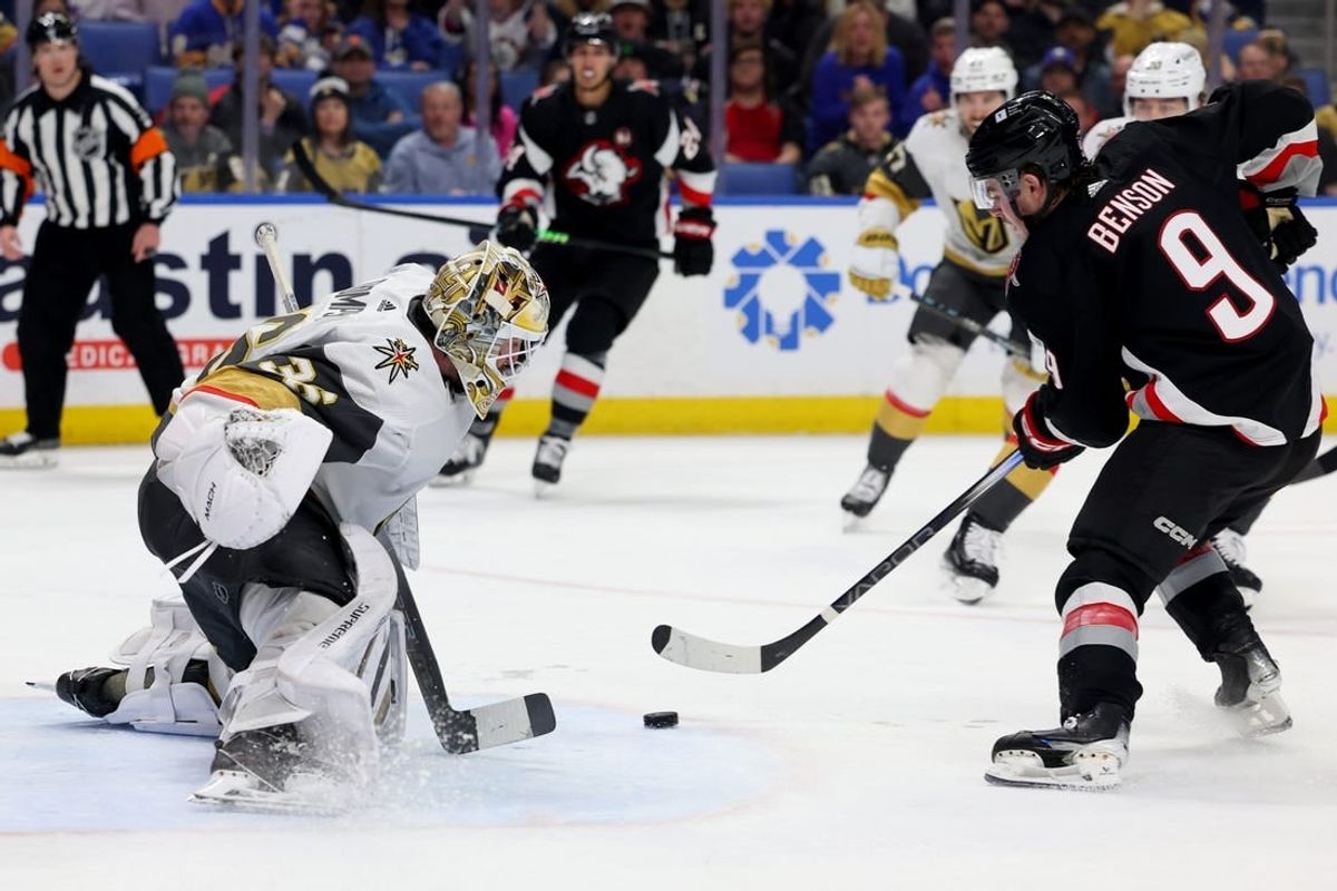 Mar 2, 2024; Buffalo, New York, USA;  Vegas Golden Knights goaltender Logan Thompson (36) looks to make a save on Buffalo Sabres left wing Zach Benson (9) during the second period at KeyBank Center.