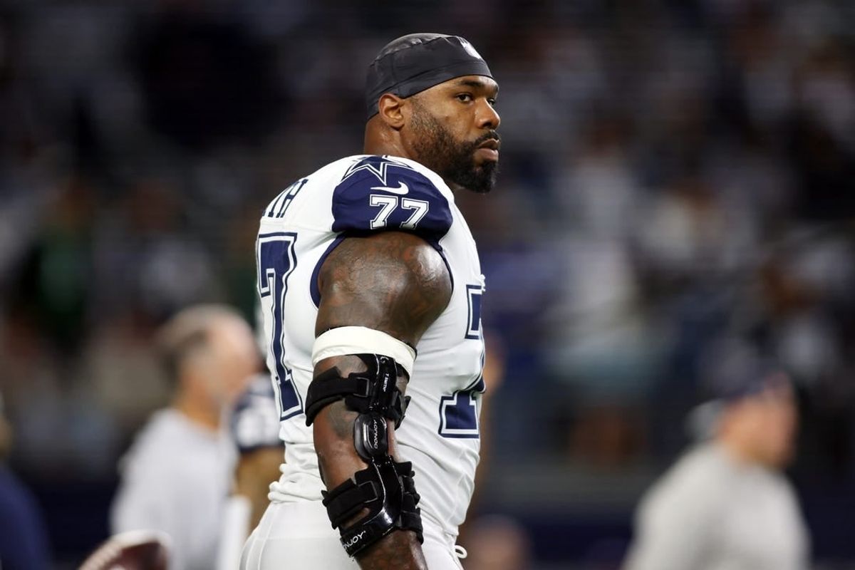 Dec 10, 2023; Arlington, Texas, USA; Dallas Cowboys offensive tackle Tyron Smith (77) on the field before the game against the Philadelphia Eagles at AT&T Stadium.