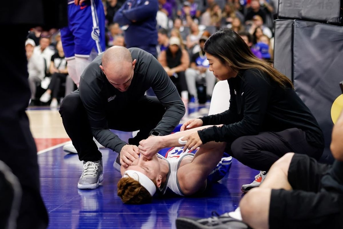 Mar 18, 2024; Sacramento, California, USA; Sacramento Kings guard Kevin Huerter (9) suffers an injury during the first quarter against the Memphis Grizzlies at Golden 1 Center.