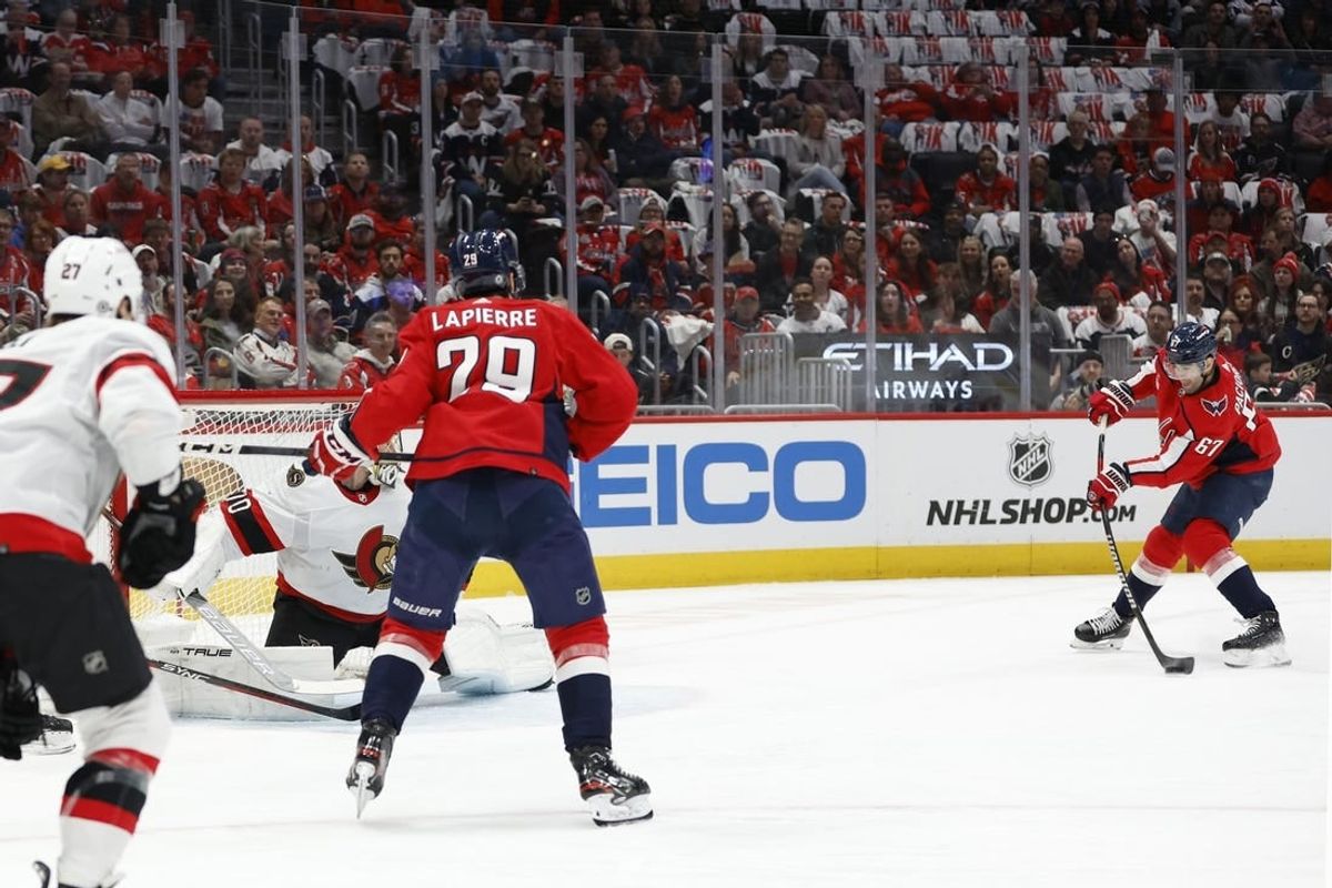 Apr 7, 2024; Washington, District of Columbia, USA; Washington Capitals left wing Max Pacioretty (67) scores a goal on Ottawa Senators goaltender Joonas Korpisalo (70) in the first period at Capital One Arena.