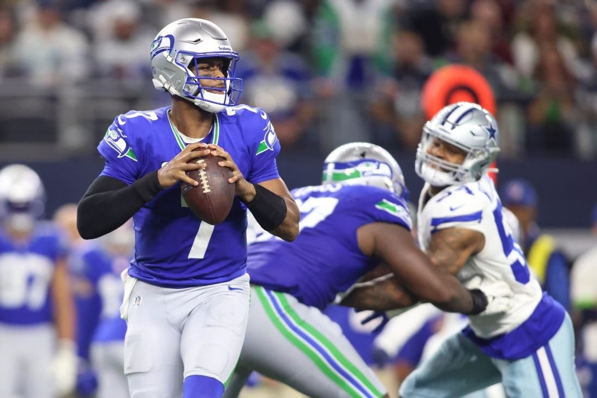 Nov 30, 2023; Arlington, Texas, USA; Seattle Seahawks quarterback Geno Smith (7) looks to pass against the Dallas Cowboys during the second half at AT&T Stadium.