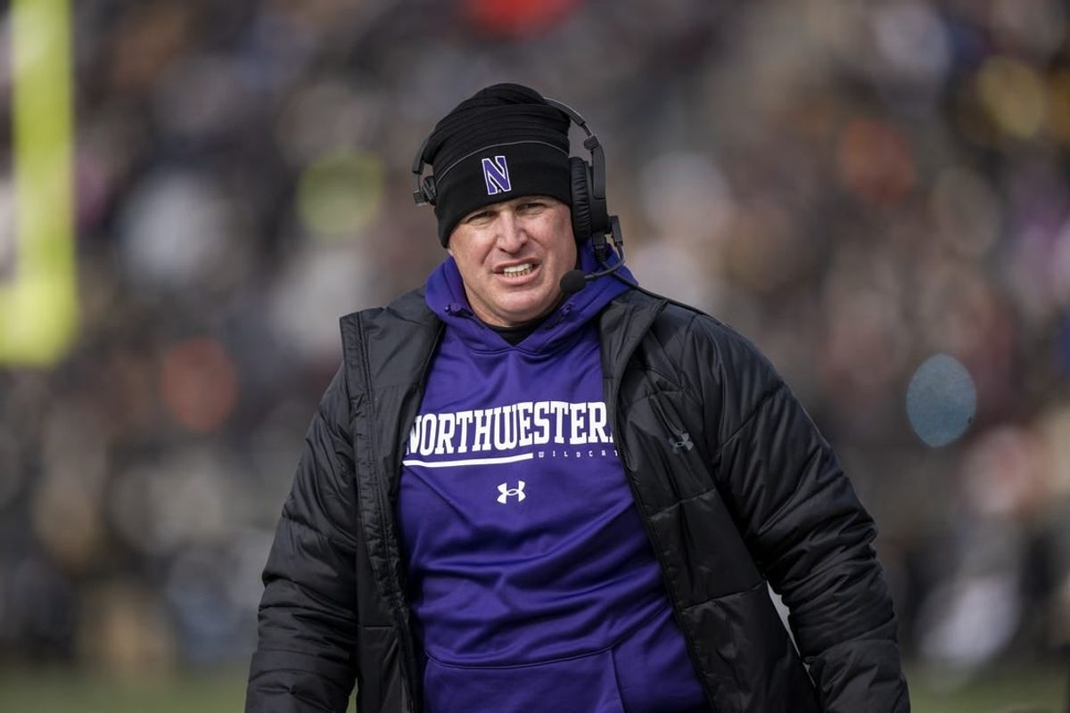 Nov 19, 2022; West Lafayette, Indiana, USA;  Northwestern Wildcats head coach Pat Fitzgerald walks the sidelines during the second quarter against the Purdue Boilermakers at Ross-Ade Stadium.