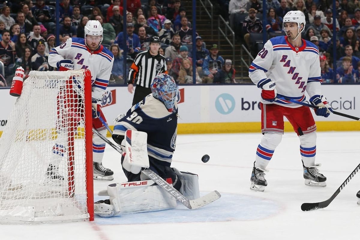Feb 25, 2024; Columbus, Ohio, USA; Columbus Blue Jackets goalie Elvis Merzlikins (90) makes a save against the New York Rangers during the third period at Nationwide Arena.