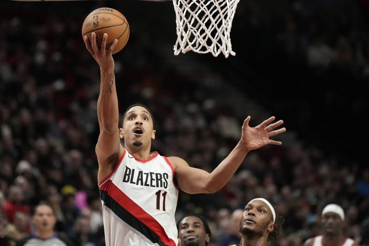 Jan 19, 2024; Portland, Oregon, USA; Portland Trail Blazers point guard Malcolm Brogdon (11) shoots the ball during the second half against the Indiana Pacers at Moda Center.