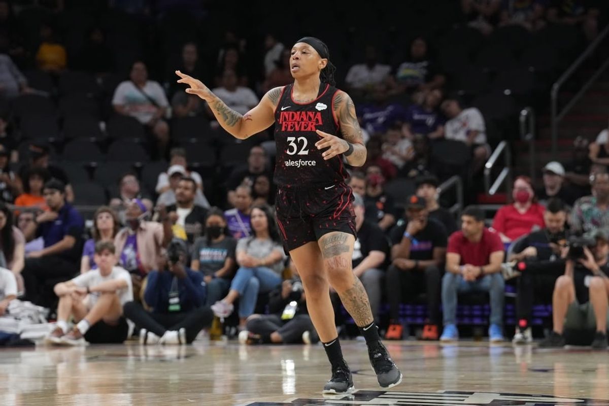 Jun 29, 2022; Phoenix, Arizona, USA; Indiana Fever forward Emma Cannon (32) reacts against the Phoenix Mercury during the second half at Footprint Center.