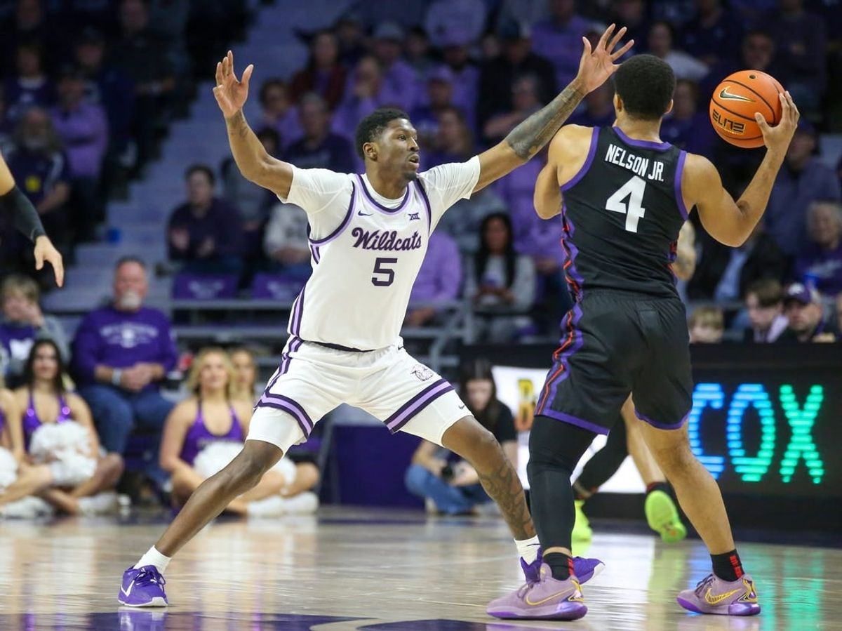Feb 17, 2024; Manhattan, Kansas, USA; Kansas State Wildcats guard Cam Carter (5) guards TCU Horned Frogs guard Jameer Nelson Jr. (4) during the first half at Bramlage Coliseum.