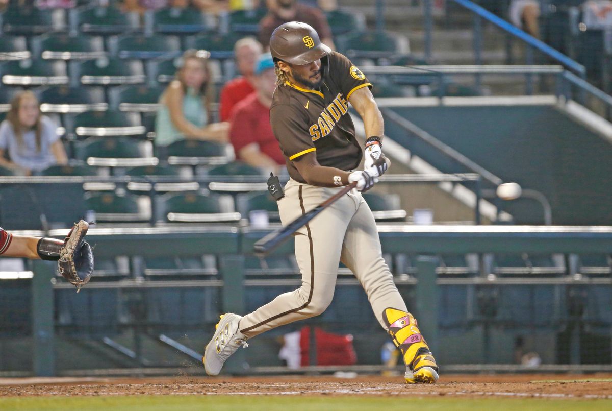 Fernando Tatis, Jr. slugs one of his two bombs Sunday.