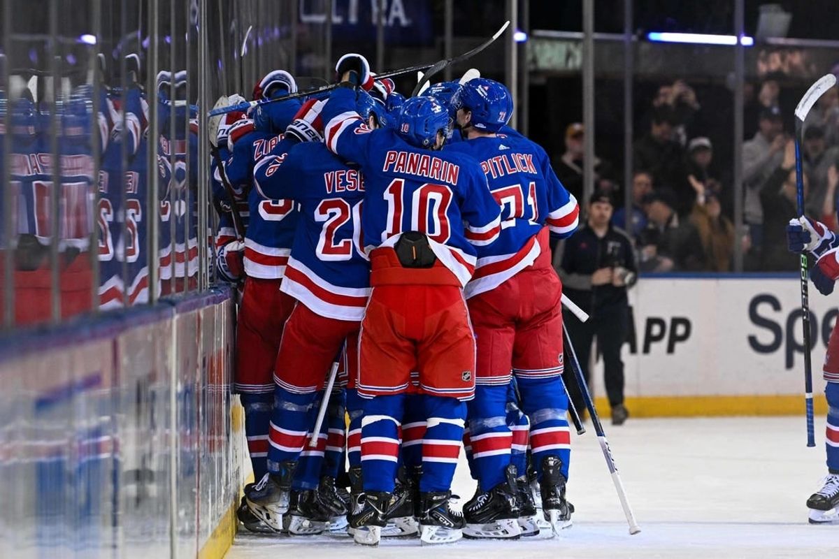Feb 5, 2024; New York, New York, USA;  New York Rangers celebrate the 2-1 victory over Colorado Avalanche after the overtime period at Madison Square Garden.