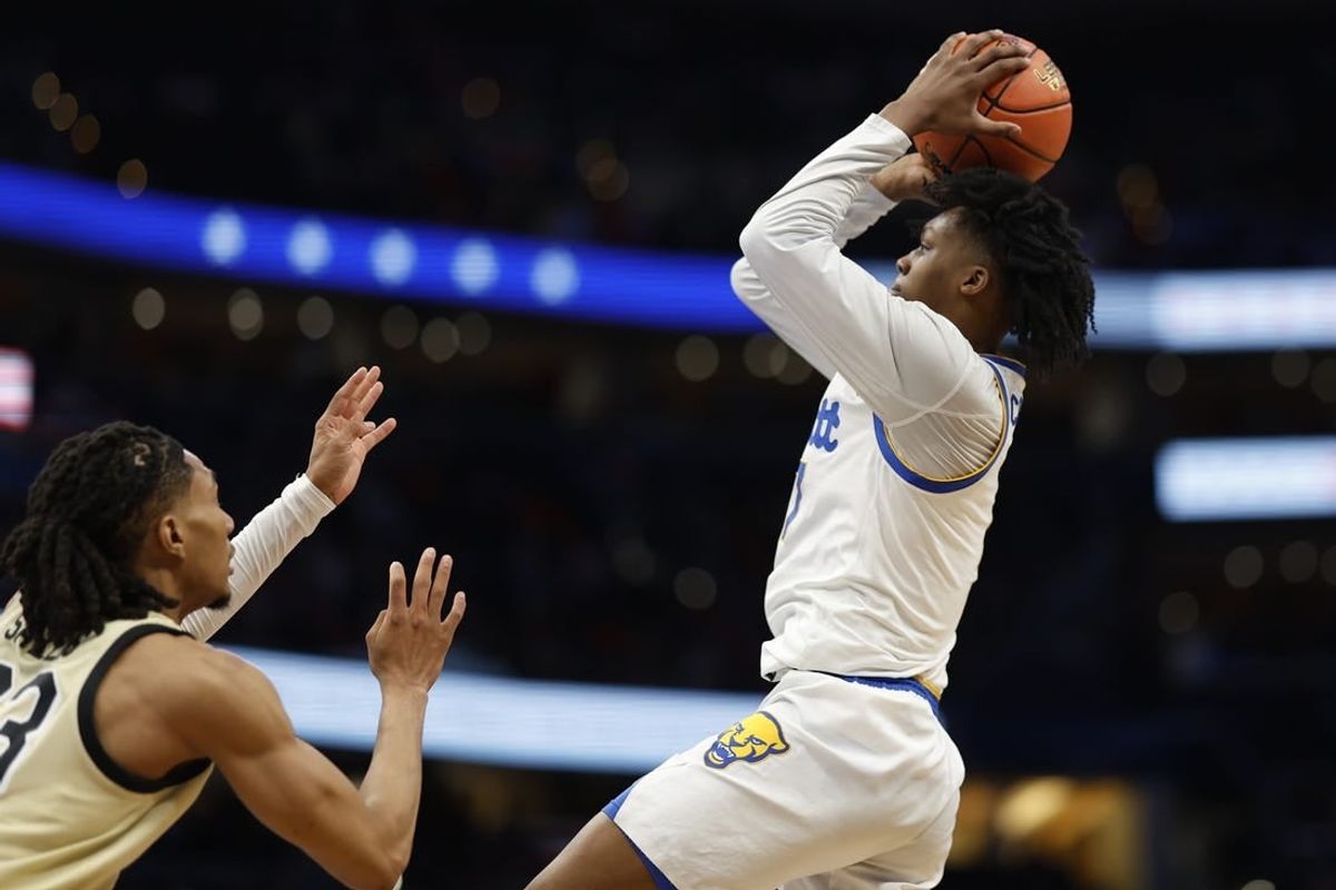 Mar 14, 2024; Washington, D.C., USA; Pittsburgh Panthers guard Carlton Carrington (7) shoots the ball as Wake Forest Demon Deacons guard Hunter Sallis (23) in the first half at Capital One Arena.