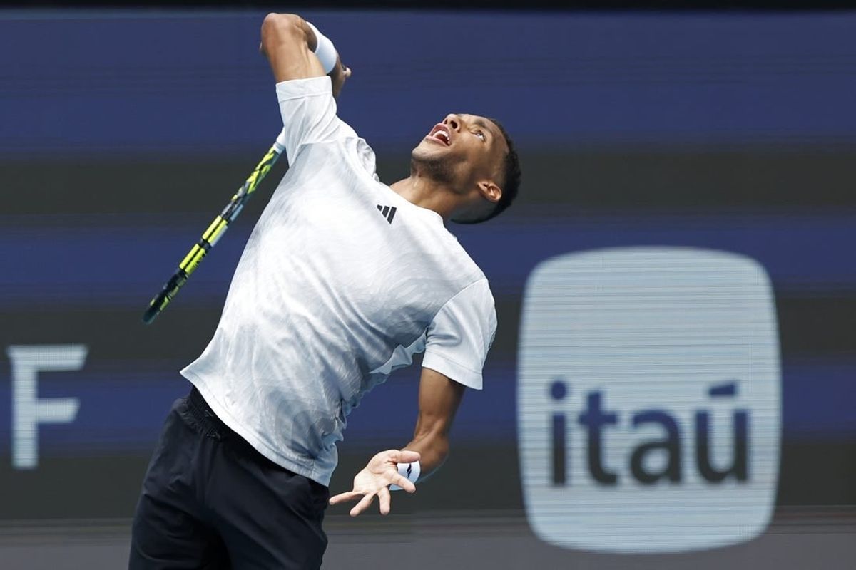 Mar 21, 2024; Miami Gardens, FL, USA; Felix Auger-Aliassime (CAN) serves against Adam Walton (AUS)(not pictured) on day four of the Miami Open at Hard Rock Stadium.