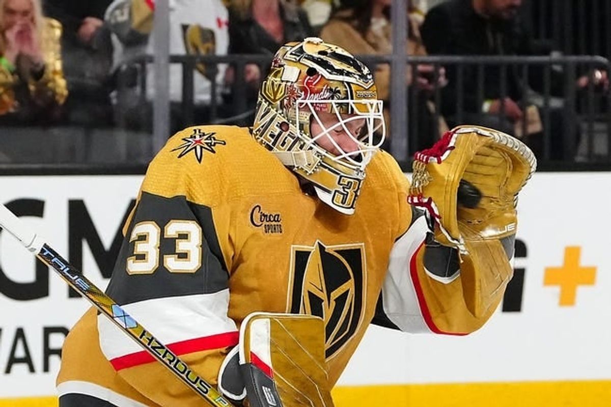 Feb 6, 2024; Las Vegas, Nevada, USA; Vegas Golden Knights goaltender Adin Hill (33) makes a glove save against the Edmonton Oilers during the second period at T-Mobile Arena.