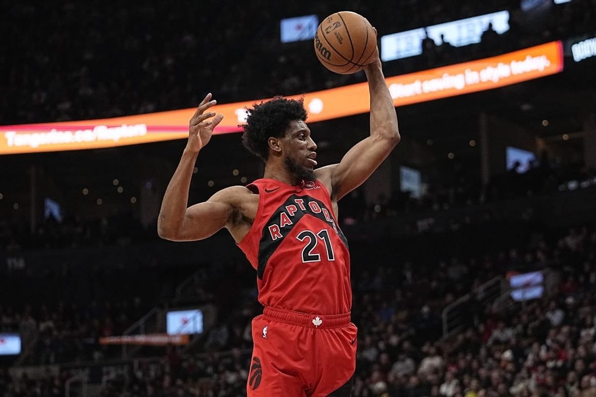 Jan 17, 2024; Toronto, Ontario, CAN; Toronto Raptors forward Thaddeus Young (21) comes down with a rebound against the Miami Heat during the first half at Scotiabank Arena.
