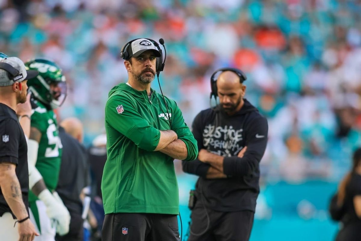 Dec 17, 2023; Miami Gardens, Florida, USA; New York Jets quarterback Aaron Rodgers (8) looks on from the sideline against the Miami Dolphins during the fourth quarter at Hard Rock Stadium.