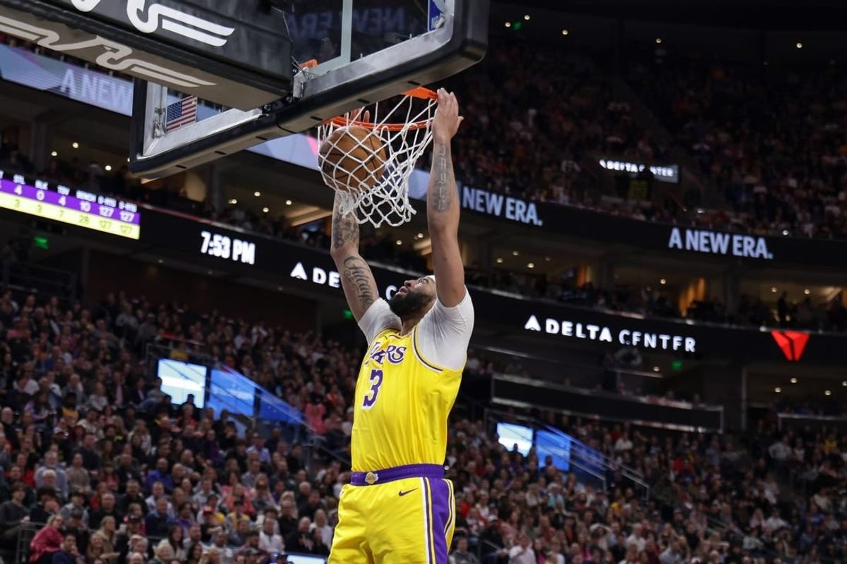 Feb 14, 2024; Salt Lake City, Utah, USA;  Utah Jazz guard Keyonte George (3) dunks the ball during the second quarter against the Utah Jazz at Delta Center.