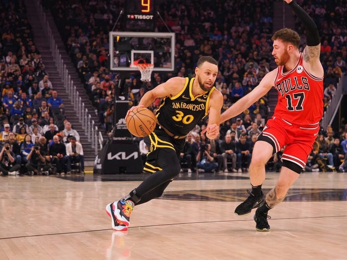 Mar 7, 2024; San Francisco, California, USA; Golden State Warriors guard Stephen Curry (30) drives in against against Chicago Bulls forward Onuralp Bitim (17) during the first quarter at Chase Center.
