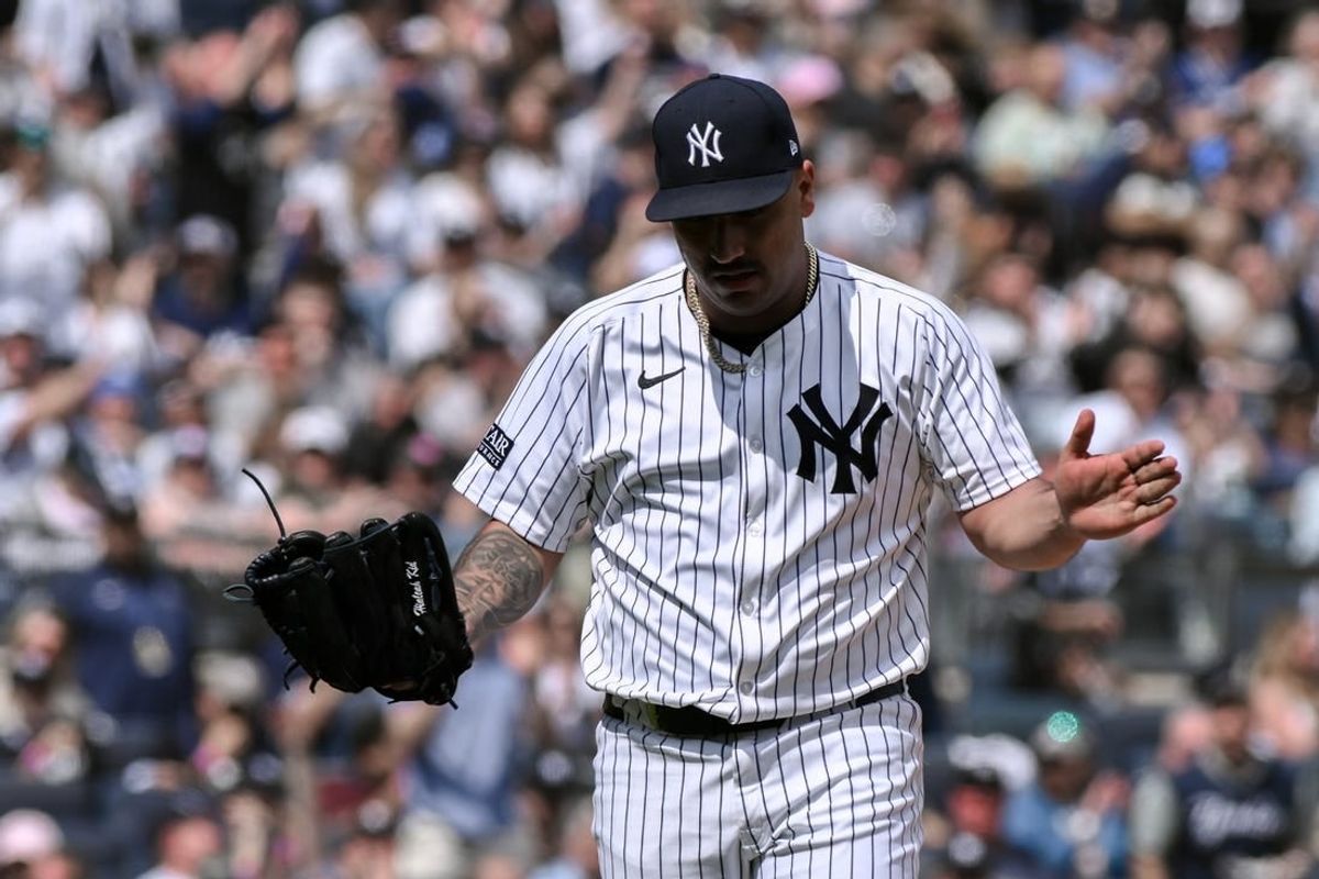 Apr 20, 2024; Bronx, New York, USA; New York Yankees pitcher Nestor Cortes (65) reacts after a strikeout against the Tampa Bay Rays during the fifth inning at Yankee Stadium.