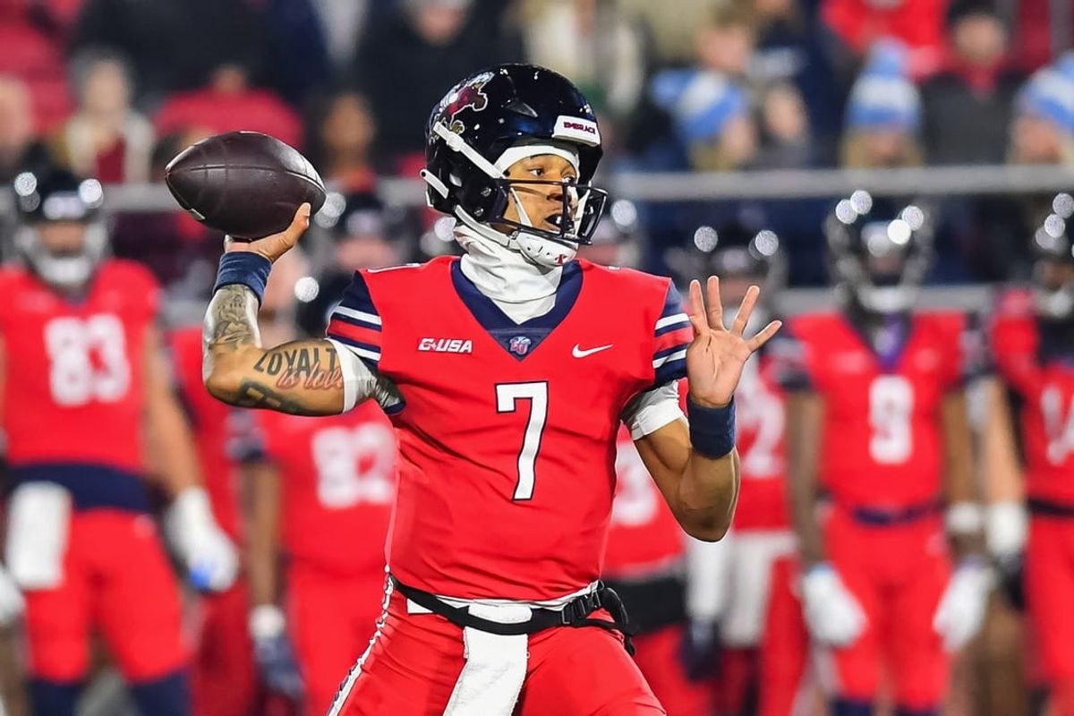 Dec 1, 2023; Lynchburg, VA, USA; Liberty Flames quarterback Kaidon Salter (7) throws a pass during the first quarter against the New Mexico State Aggies at Williams Stadium.