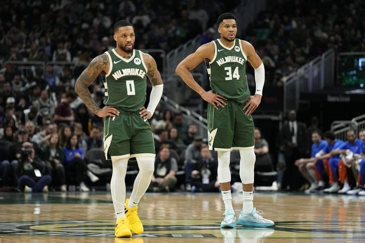 Mar 24, 2024; Milwaukee, Wisconsin, USA;  Milwaukee Bucks forward Giannis Antetokounmpo (34) and guard Damian Lillard (0) during the game against the Oklahoma City Thunder at Fiserv Forum.
