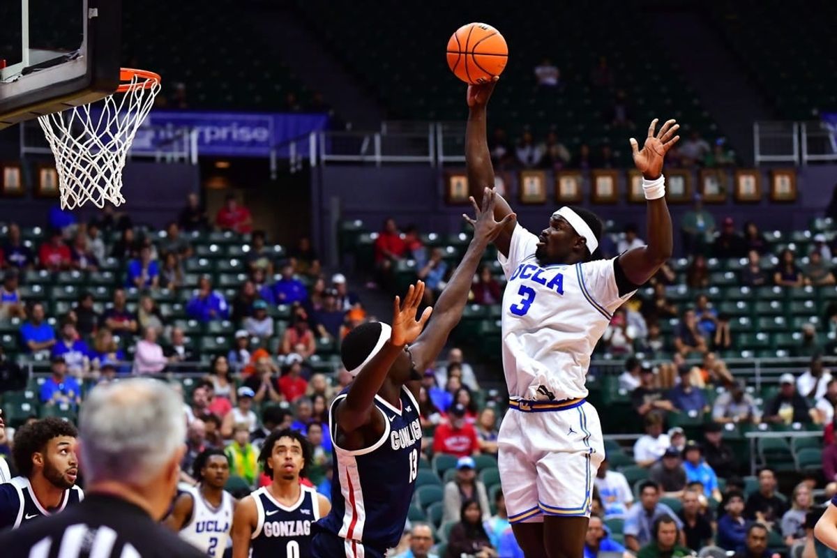 Nov 22, 2023; Honolulu, HI, USA; UCLA Bruins forward Adem Bona (3) shot the ball defended by Gonzaga Bulldogs forward Graham Ike (13) during the second period at SimpliFi Arena at Stan Sheriff Center.