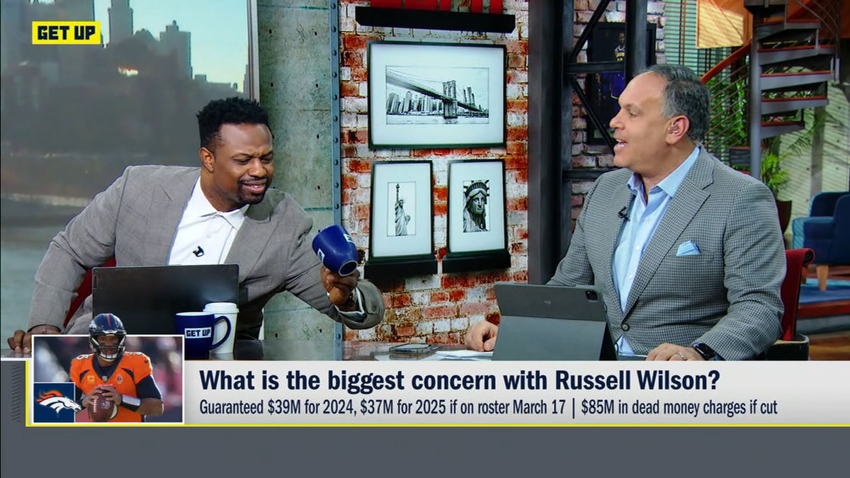 Bart Scott (l.) and Mike Tannebaum