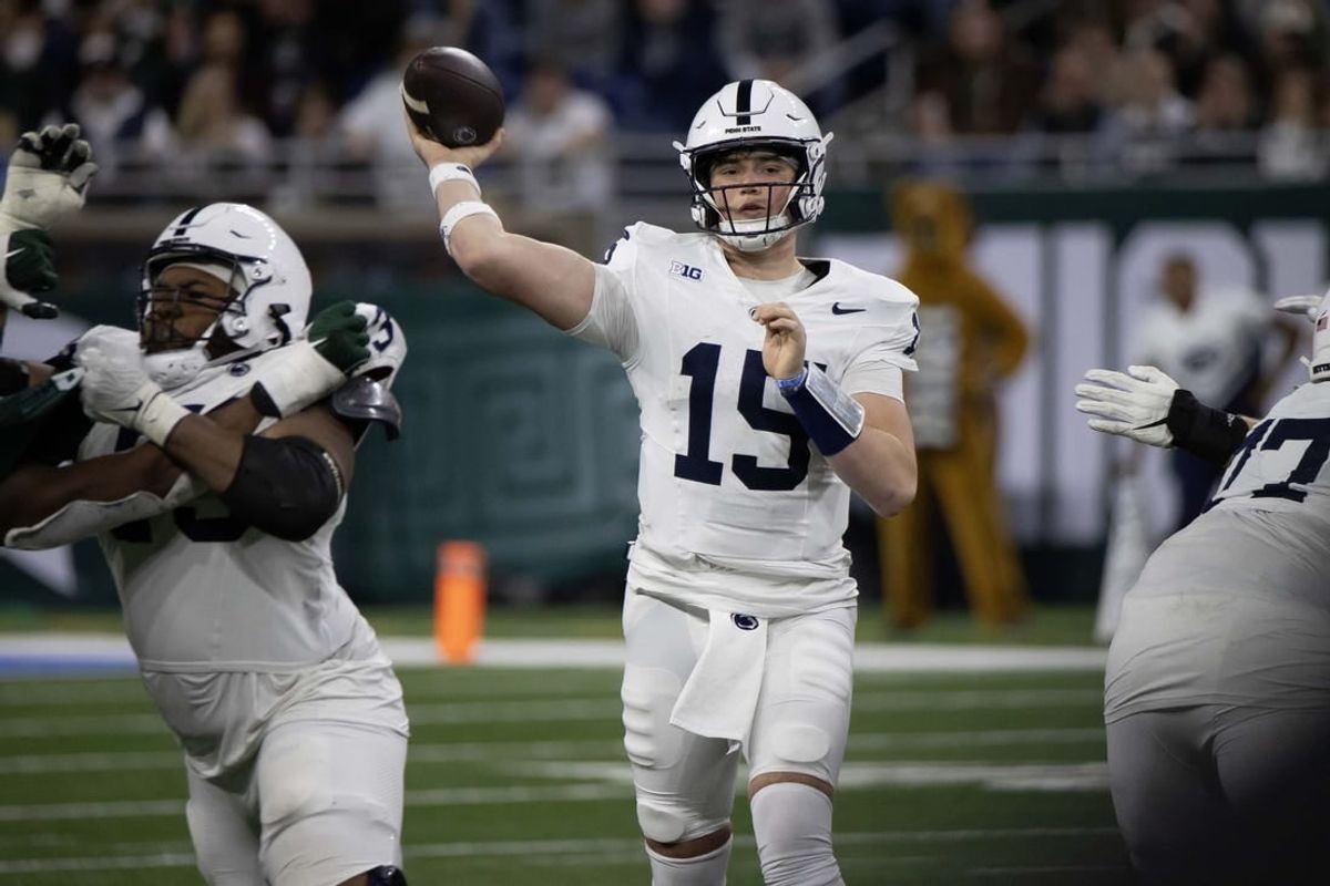 Nov 24, 2023; Detroit, Michigan, USA; Penn State Nittany Lions quarterback Drew Allar (15) passes the ball against the Michigan State Spartans during the second half at Ford Field.
