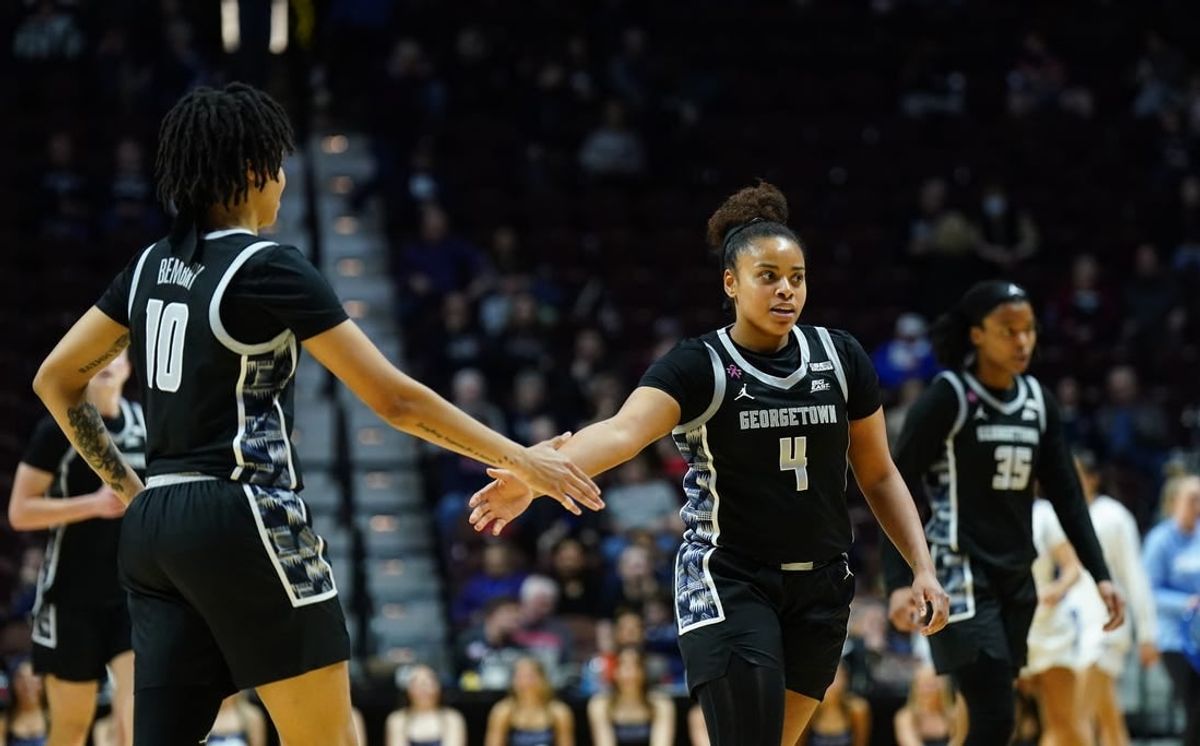 Mar 10, 2024; Uncasville, CT, USA; Georgetown Hoyas guard Alex Cowan (4) and forward Mya Bembry (10) react after a play in the first half at Mohegan Sun Arena.
