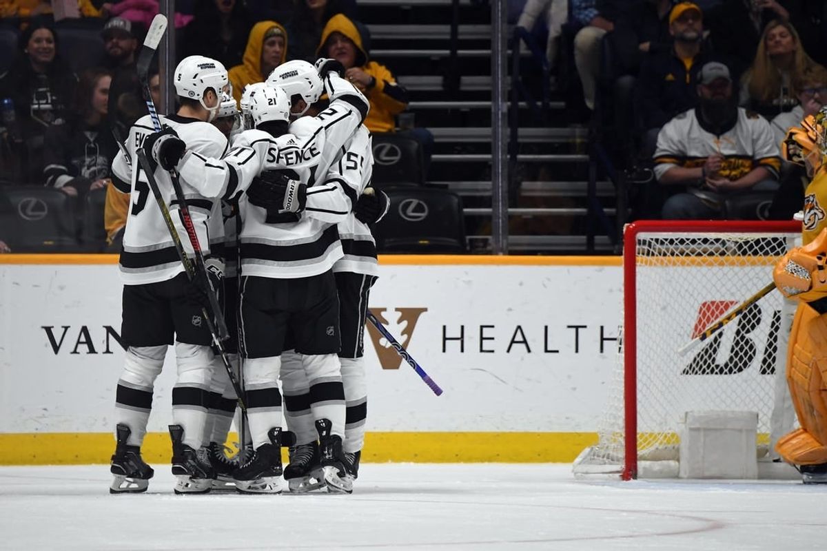 Jan 31, 2024; Nashville, Tennessee, USA; Los Angeles Kings players celebrate after a goal by center Trevor Lewis (61) during the third period against the Nashville Predators at Bridgestone Arena.