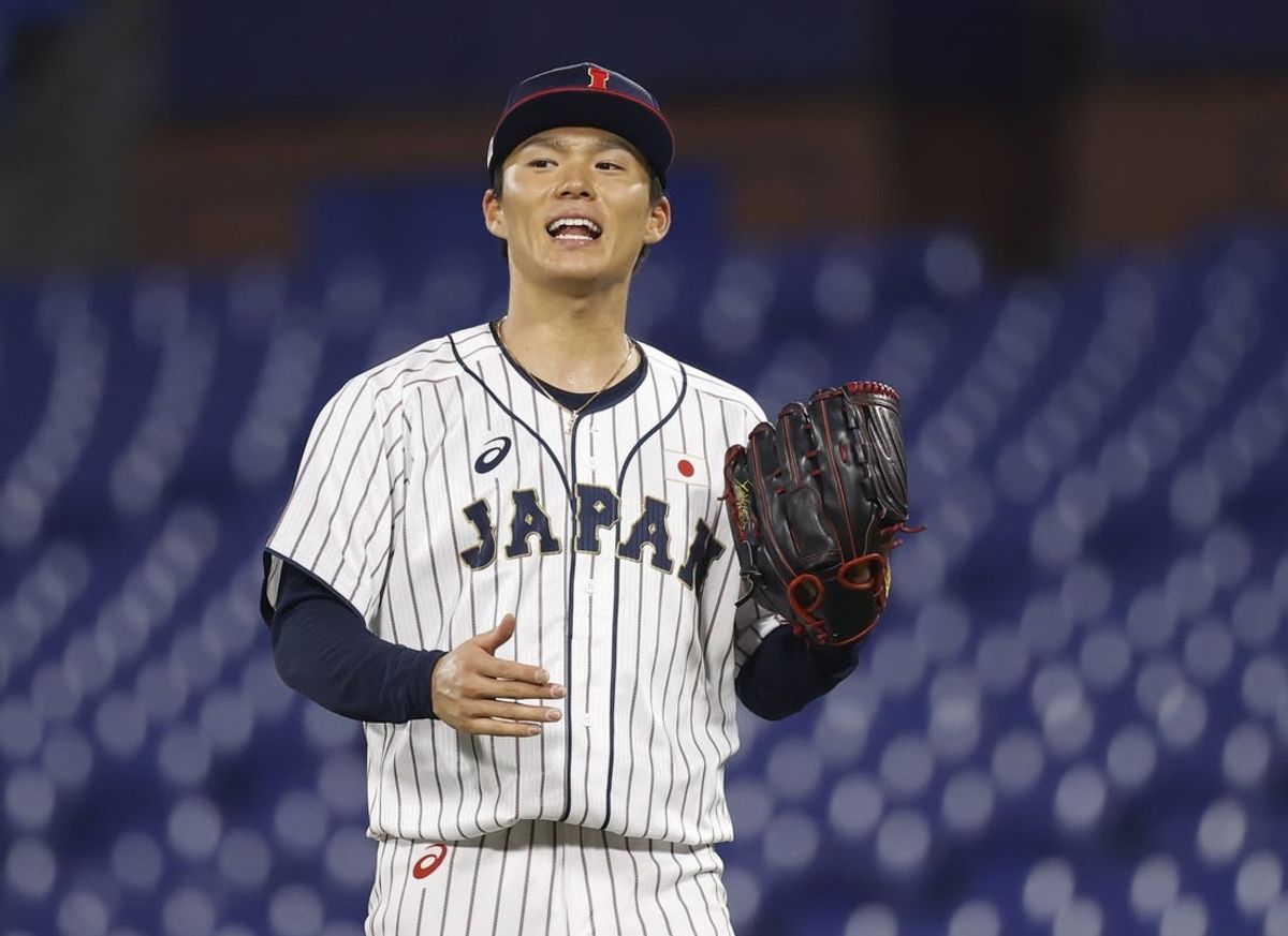 Aug 4, 2021; Yokohama, Japan; Team Japan pitcher Yoshinobu Yamamoto (17) reacts against Korea in a baseball semifinal match during the Tokyo 2020 Olympic Summer Games at Yokohama Baseball Stadium.