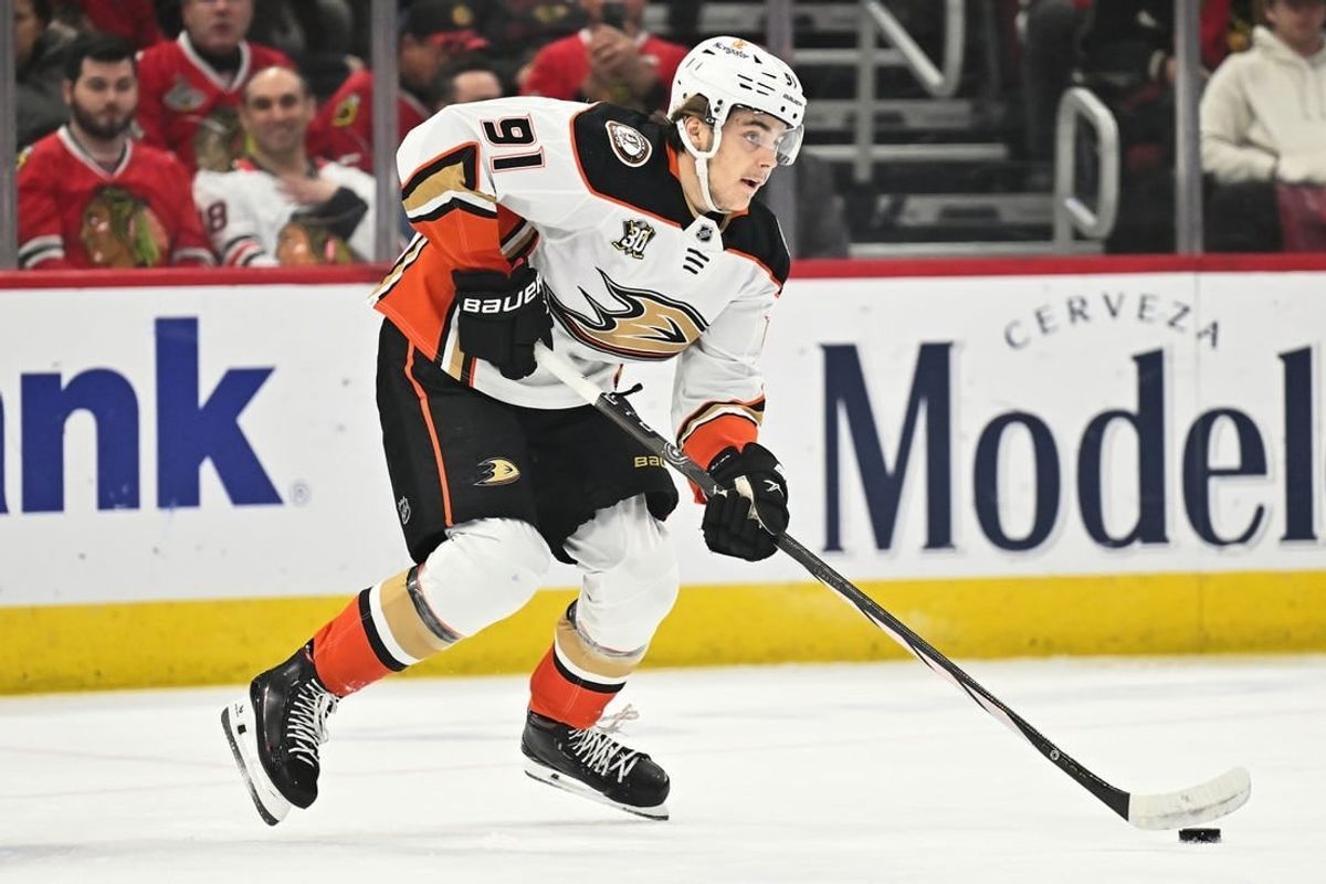 Dec 7, 2023; Chicago, Illinois, USA; Anaheim Ducks forward Leo Carlsson (91) controls the puck in the first period against the Chicago Blackhawks at United Center.