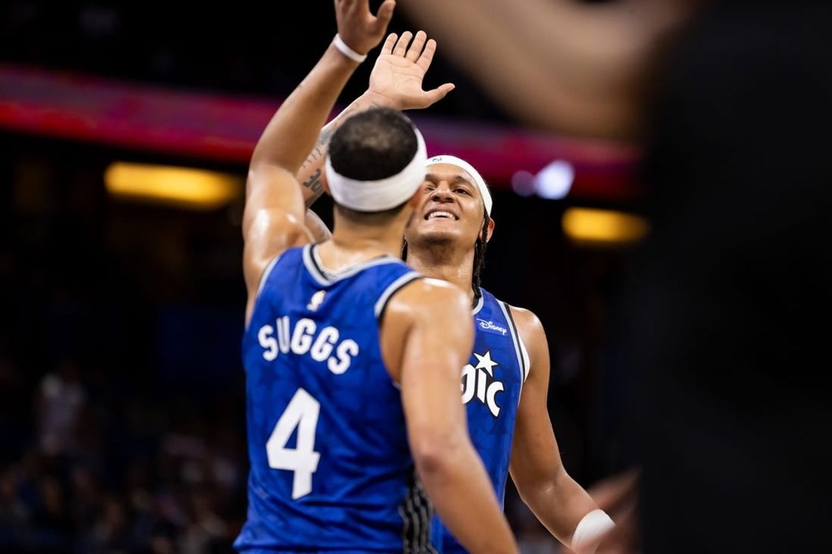 Nov 11, 2023; Orlando, Florida, USA; Orlando Magic forward Paolo Banchero (5) and Orlando Magic guard Jalen Suggs (4) celebrate during the second half against the Milwaukee Bucks at Amway Center.