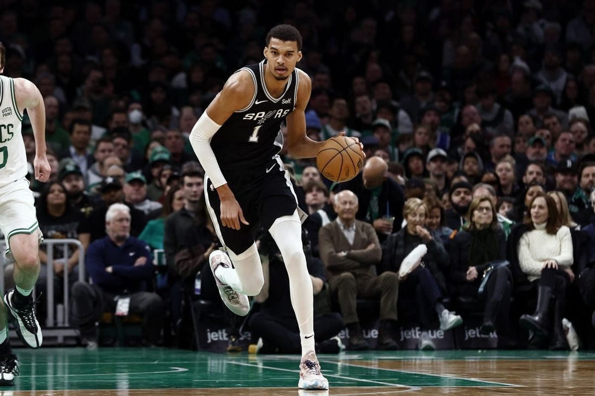 Jan 17, 2024; Boston, Massachusetts, USA; San Antonio Spurs center Victor Wembanyama (1) brings the ball up the court against the Boston Celtics during the second half at TD Garden.
