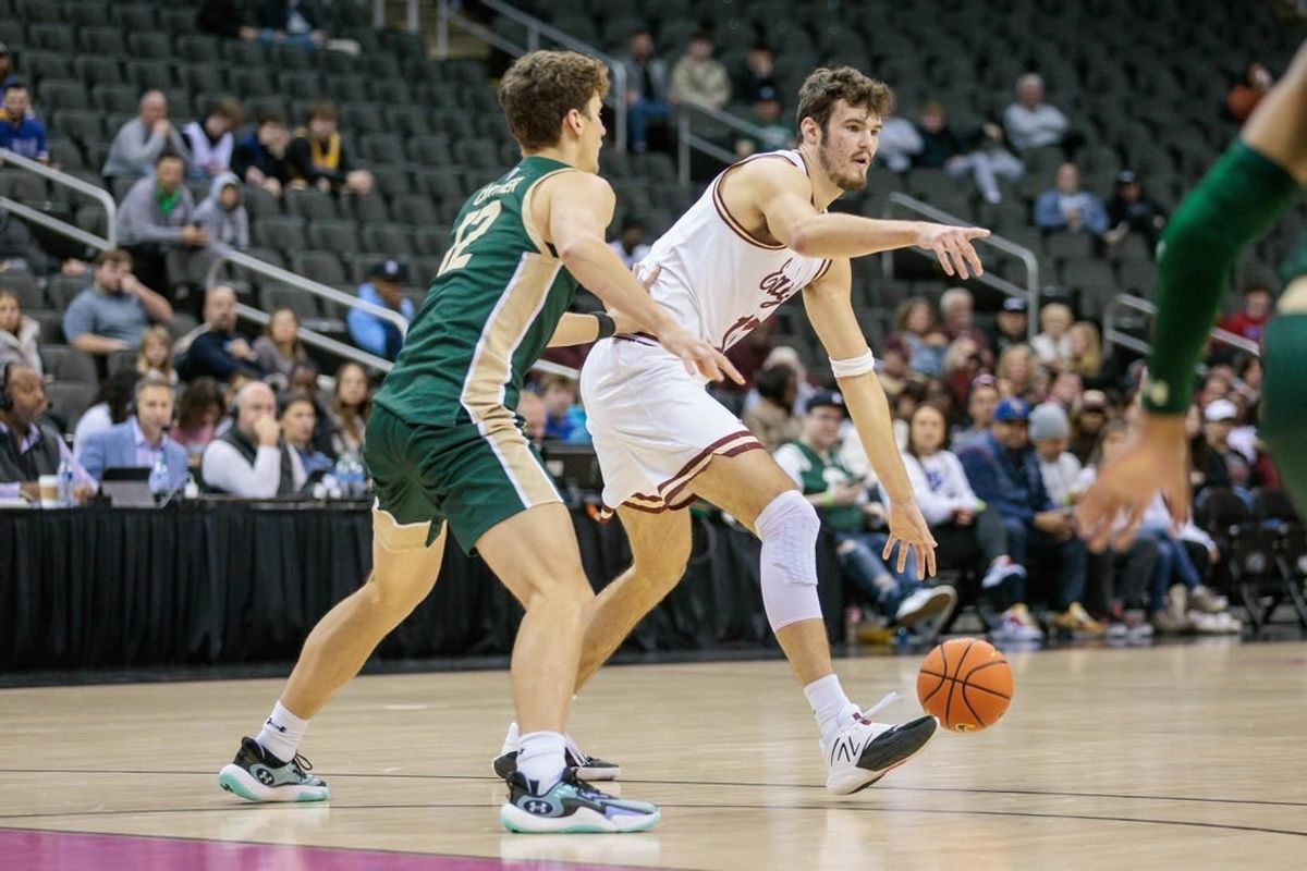 Nov 22, 2023; Kansas City, Missouri, USA; Boston College Eagles forward Quinten Post (12) looks to set the play during the first half against the Colorado State Rams at T-Mobile Center.