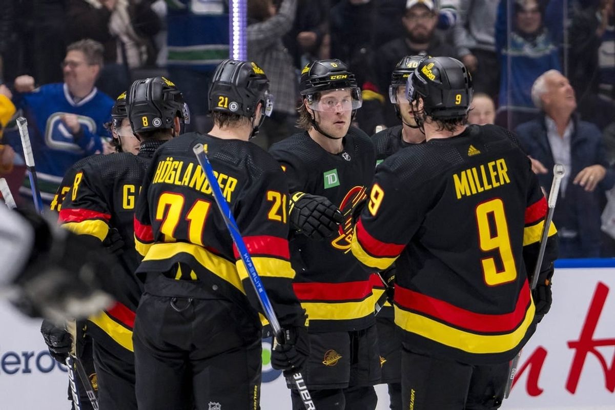 Mar 25, 2024; Vancouver, British Columbia, CAN;  Vancouver Canucks defenseman Quinn Hughes (43), forward Nils Hoglander (21), forward Brock Boeser (6), forward J.T. Miller (9) and forward Elias Pettersson (40) celebrate Boeser’s goal against the Los Angeles Kings in the third period at Rogers Arena. Kings won 3 -2.