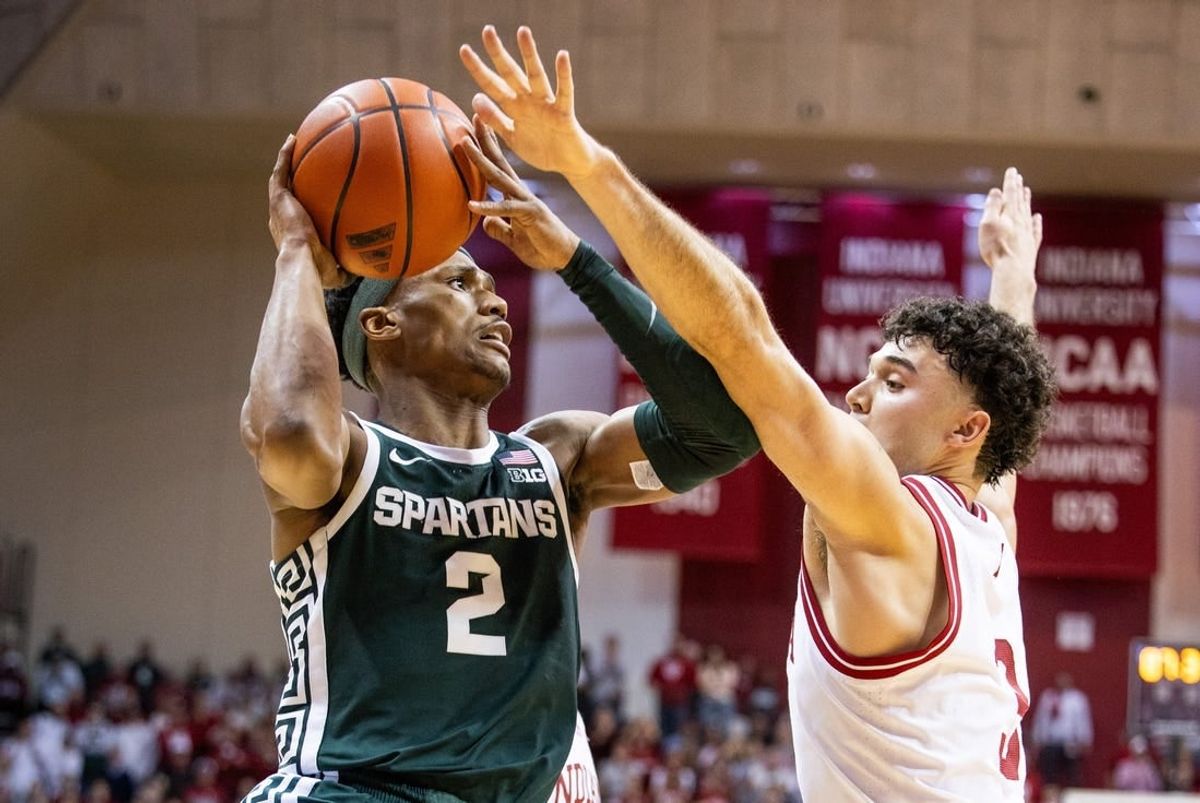 Mar 10, 2024; Bloomington, Indiana, USA; Michigan State Spartans guard Tyson Walker (2) shoots the ball while  Indiana Hoosiers guard Anthony Leal (3) defends in the second half at Simon Skjodt Assembly Hall.