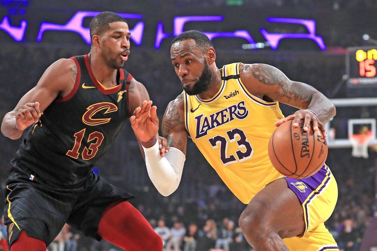 Tristan Thompson, now of the Boston Celtics,  guards former teammate LeBron James.