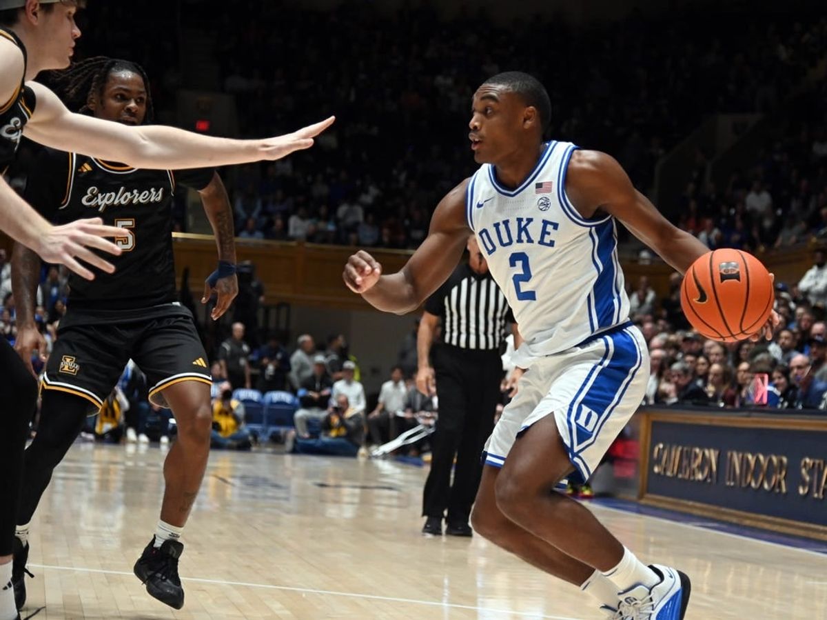 Nov 21, 2023; Durham, North Carolina, USA; Duke Blue Devils guard Jaylen Blakes (2) controls the ball in front of La Salle Explorers forward Rokas Jucius (35) during the second half at Cameron Indoor Stadium. The Blue Devils won 95-66.