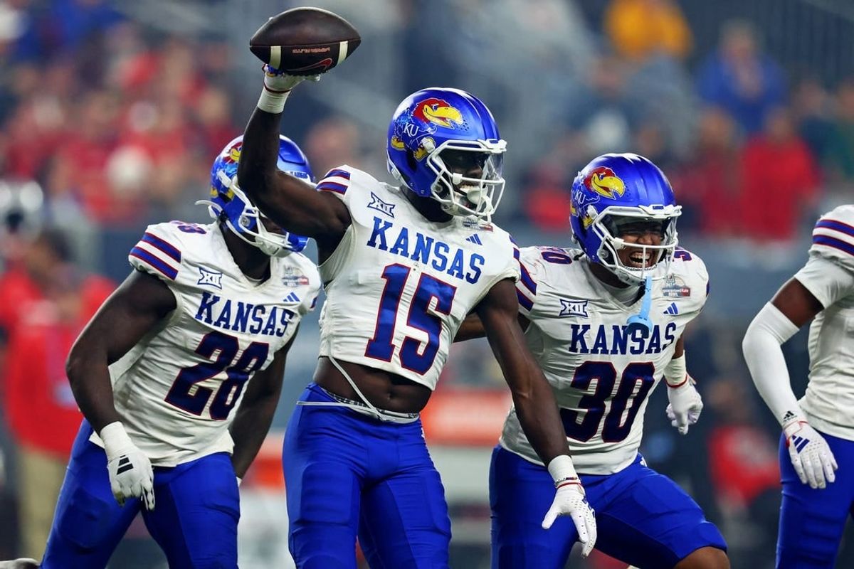 Kansas Jayhawks linebacker Craig Young (15) is one of the 10 overlooked prospects to know entering the 2024 NFL Draft.